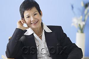 AsiaPix - Business woman smiling at camera