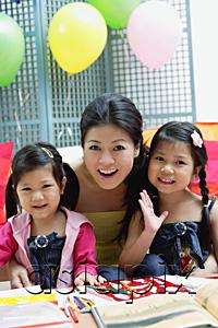 AsiaPix - Mother and two daughters, portrait