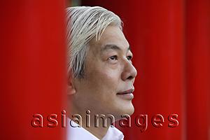 Asia Images Group - Profile of older man looking up