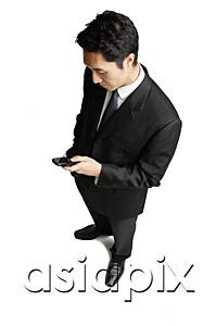 AsiaPix - Businessman with mobile phone